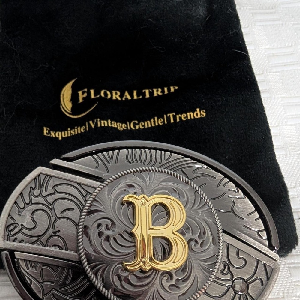 Floraltrip Silver & Gold Buckle with ornate floral and scrollwork design'